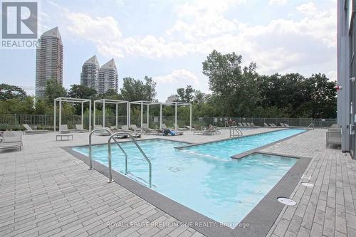 210 - 90 Park Lawn Road, Toronto, ON - Outdoor With In Ground Pool With Backyard