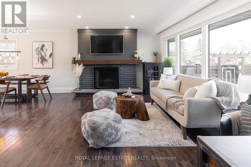 18 Cudia Cres, Toronto, ON - Indoor Photo Showing Living Room With Fireplace