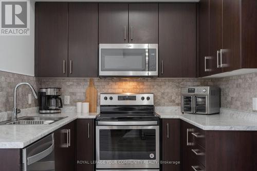 #216 -3865 Major Mackenzie Dr W, Vaughan, ON - Indoor Photo Showing Kitchen With Double Sink With Upgraded Kitchen