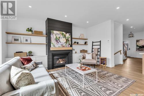 174 Keith Way, Saskatoon, SK - Indoor Photo Showing Living Room With Fireplace