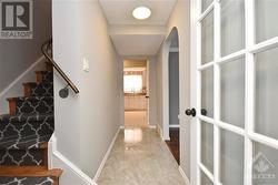 Foyer with closet and a french door. - 