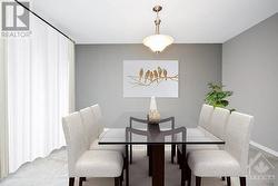 Dining room staged - check out those patio doors. - 