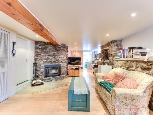 Sous-sol - 180 7E Rue Du Parc-Bleu, Sainte-Marcelline-De-Kildare, QC - Indoor Photo Showing Living Room With Fireplace