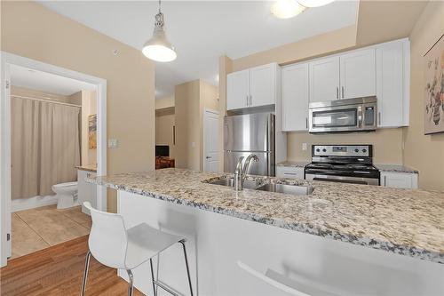 35 Southshore Crescent|Unit #303, Stoney Creek, ON - Indoor Photo Showing Kitchen With Stainless Steel Kitchen With Double Sink With Upgraded Kitchen