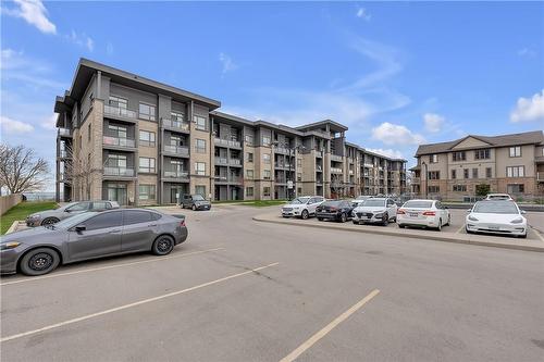 35 Southshore Crescent|Unit #303, Stoney Creek, ON - Outdoor With Balcony With Facade