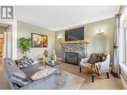 470 Trumpeter Road, Kelowna, BC - Indoor Photo Showing Living Room With Fireplace