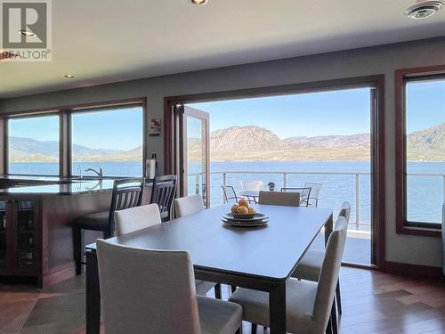 17217 87Th Street, Osoyoos, BC - Indoor Photo Showing Dining Room With Body Of Water