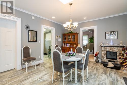 3608 Concession Drive, Southwest Middlesex, ON - Indoor Photo Showing Dining Room With Fireplace