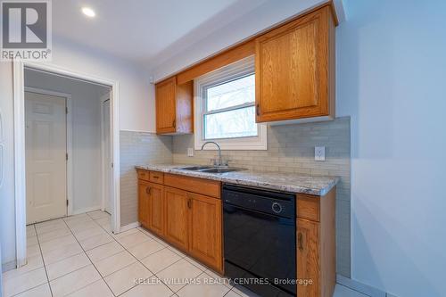 4983 University Avenue, Niagara Falls, ON - Indoor Photo Showing Kitchen With Double Sink