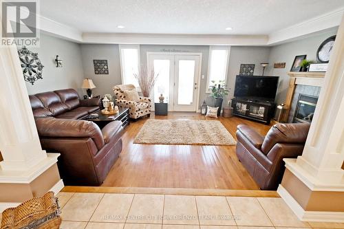 115 Hagerman Cres, St. Thomas, ON - Indoor Photo Showing Living Room With Fireplace