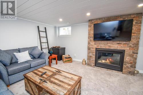 14 - 90 Burke Street N, Penetanguishene, ON - Indoor Photo Showing Living Room With Fireplace