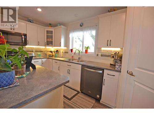 31 4072 Lac La Hache Stn Road, Lac La Hache, BC - Indoor Photo Showing Kitchen With Double Sink