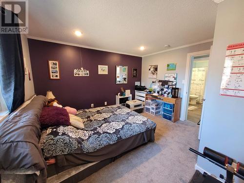 31 4072 Lac La Hache Stn Road, Lac La Hache, BC - Indoor Photo Showing Bedroom