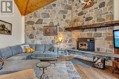 33 Birchcliff Ave, Kawartha Lakes, ON - Indoor Photo Showing Living Room With Fireplace