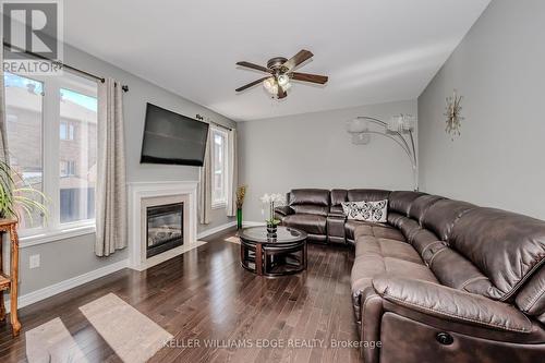 3322 Stoneware Rd, Burlington, ON - Indoor Photo Showing Living Room With Fireplace