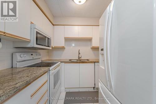 #411 -1525 Diefenbaker Crt, Pickering, ON - Indoor Photo Showing Kitchen With Double Sink