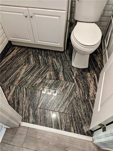 Granite floor in bathroom - 274 King Street W|Unit #1, Hamilton, ON - Indoor