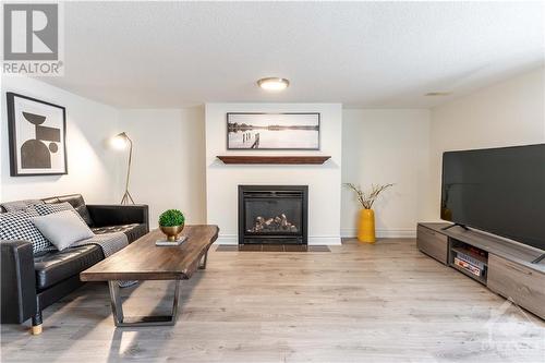 749 Percifor Way, Orleans, ON - Indoor Photo Showing Living Room With Fireplace
