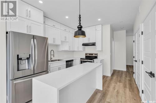 212B Taylor Street W, Saskatoon, SK - Indoor Photo Showing Kitchen With Upgraded Kitchen