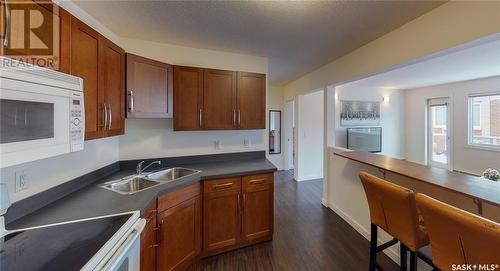 18 2060 Lorne Street, Regina, SK - Indoor Photo Showing Kitchen With Double Sink