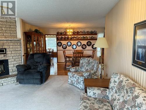 25 Swain Crescent, Humboldt, SK - Indoor Photo Showing Living Room With Fireplace