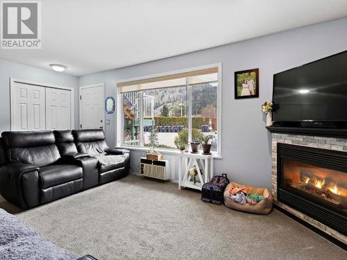 380 Shepherd Road Unit# 106, Chase, BC - Indoor Photo Showing Living Room With Fireplace