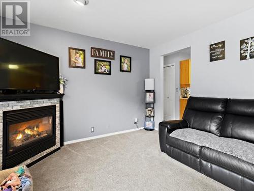 380 Shepherd Road Unit# 106, Chase, BC - Indoor Photo Showing Living Room With Fireplace