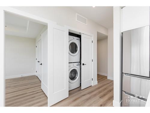 603 6285 King George Boulevard, Surrey, BC - Indoor Photo Showing Laundry Room