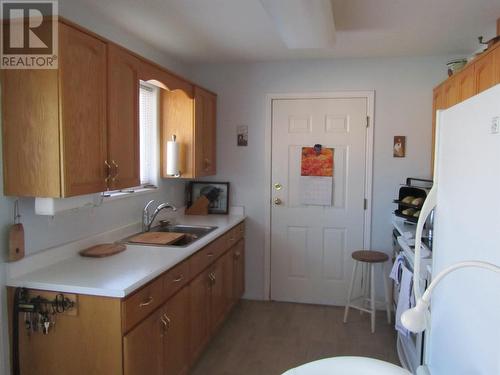 1 204 8Th Street, 100 Mile House, BC - Indoor Photo Showing Kitchen With Double Sink