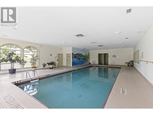 4074 Gellatly Road Unit# 233, West Kelowna, BC - Indoor Photo Showing Other Room With In Ground Pool