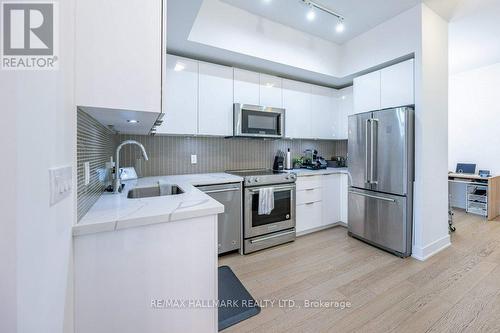 509 - 20 Shore Breeze Drive, Toronto, ON - Indoor Photo Showing Kitchen With Stainless Steel Kitchen With Upgraded Kitchen