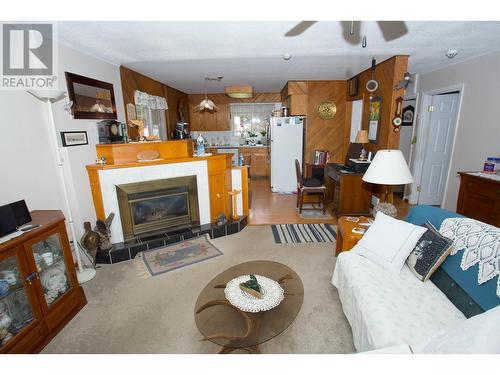 1914 Norwood Street, Prince George, BC - Indoor Photo Showing Living Room With Fireplace