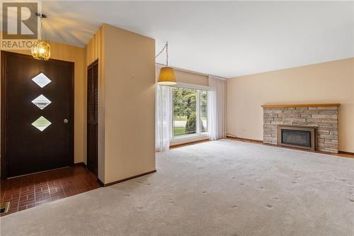1 Robert Road, Prescott, ON - Indoor Photo Showing Living Room With Fireplace