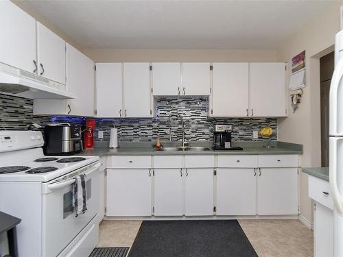 620 Treanor Ave, Langford, BC - Indoor Photo Showing Kitchen With Double Sink