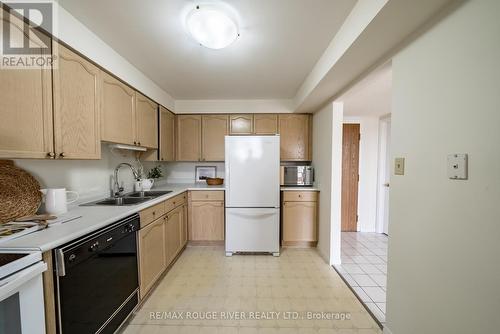 #302 -1 Queen St, Cobourg, ON - Indoor Photo Showing Kitchen With Double Sink