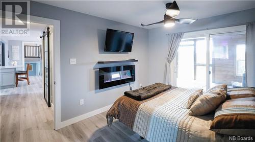 21 Jacks Road, Saint John, NB - Indoor Photo Showing Bedroom With Fireplace