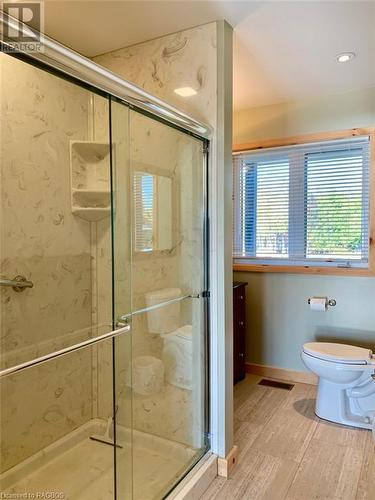 Ensuite has an over-sized shower with glass door. - 34 Hatt Street, Northern Bruce Peninsula, ON - Indoor Photo Showing Bathroom