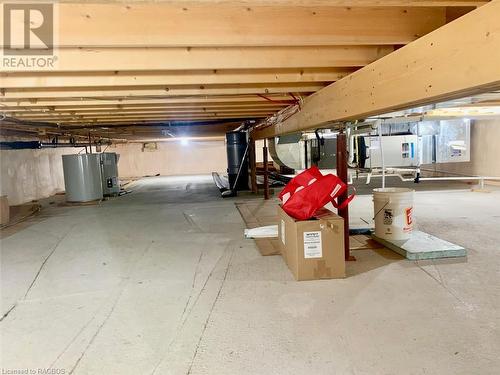 Fully spray foamed crawl space with concrete floor houses the mechanicals including Lennox High-Efficiency Forced Air Furnace & HRV systems. - 34 Hatt Street, Northern Bruce Peninsula, ON - Indoor Photo Showing Garage