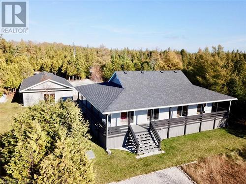Steps from the front door is the bunkie / guest area. - 34 Hatt Street, Northern Bruce Peninsula, ON - Outdoor
