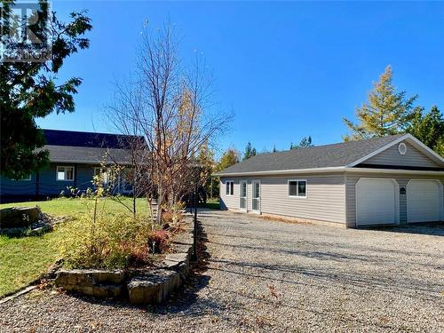 Property offers a circular drive and plenty of parking for up to 10 cars. - 34 Hatt Street, Northern Bruce Peninsula, ON - Outdoor