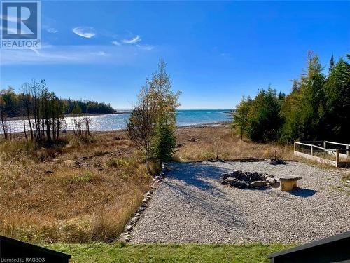 Shoreside firepit area. - 34 Hatt Street, Northern Bruce Peninsula, ON - Outdoor With Body Of Water With View