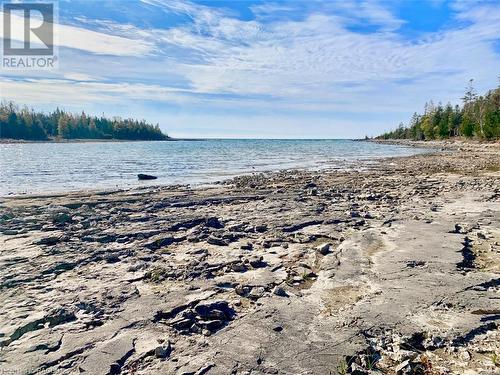 Flat, solid limestone shoreline for easy water access. - 34 Hatt Street, Northern Bruce Peninsula, ON - Outdoor With Body Of Water With View