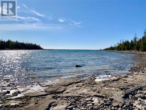 Smooth entry in to the crystal clear water. - 34 Hatt Street, Northern Bruce Peninsula, ON - Outdoor With Body Of Water With View