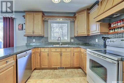 85 Jackson Street, Katepwa Beach, SK - Indoor Photo Showing Kitchen With Double Sink