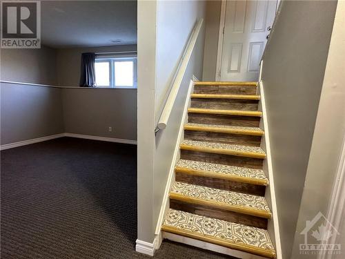 Stairway to Lower Level - 410 Slater Road, Kemptville, ON - Indoor Photo Showing Other Room