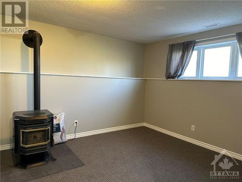 Family Room (Lower Level) - 410 Slater Road, Kemptville, ON - Indoor Photo Showing Other Room