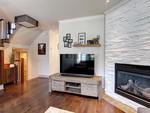 Living room - 232 Rue De La Renaissance, Blainville, QC - Indoor Photo Showing Living Room With Fireplace