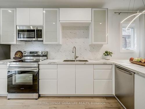 63 Manitoba St, Toronto, ON - Indoor Photo Showing Kitchen With Upgraded Kitchen