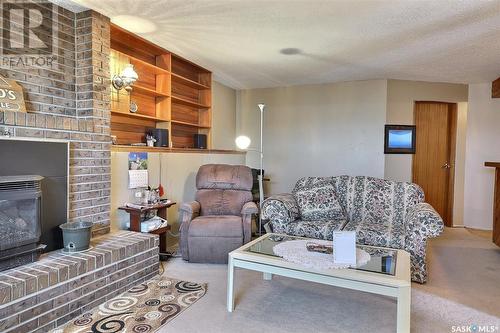 Bechard Acreage, Longlaketon Rm No. 219, SK - Indoor Photo Showing Living Room With Fireplace