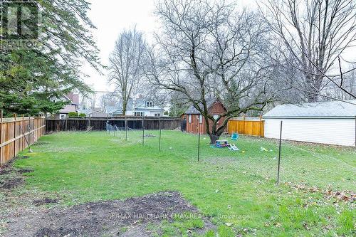 74 Queen Street W, Springwater, ON - Outdoor With Backyard